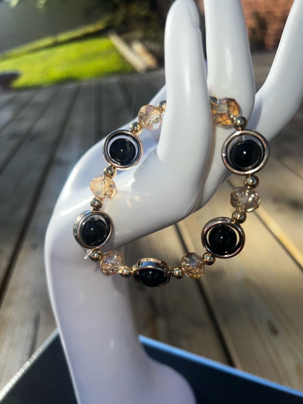 Elegant Black Bead and Gold Tone Stretch Bracelet